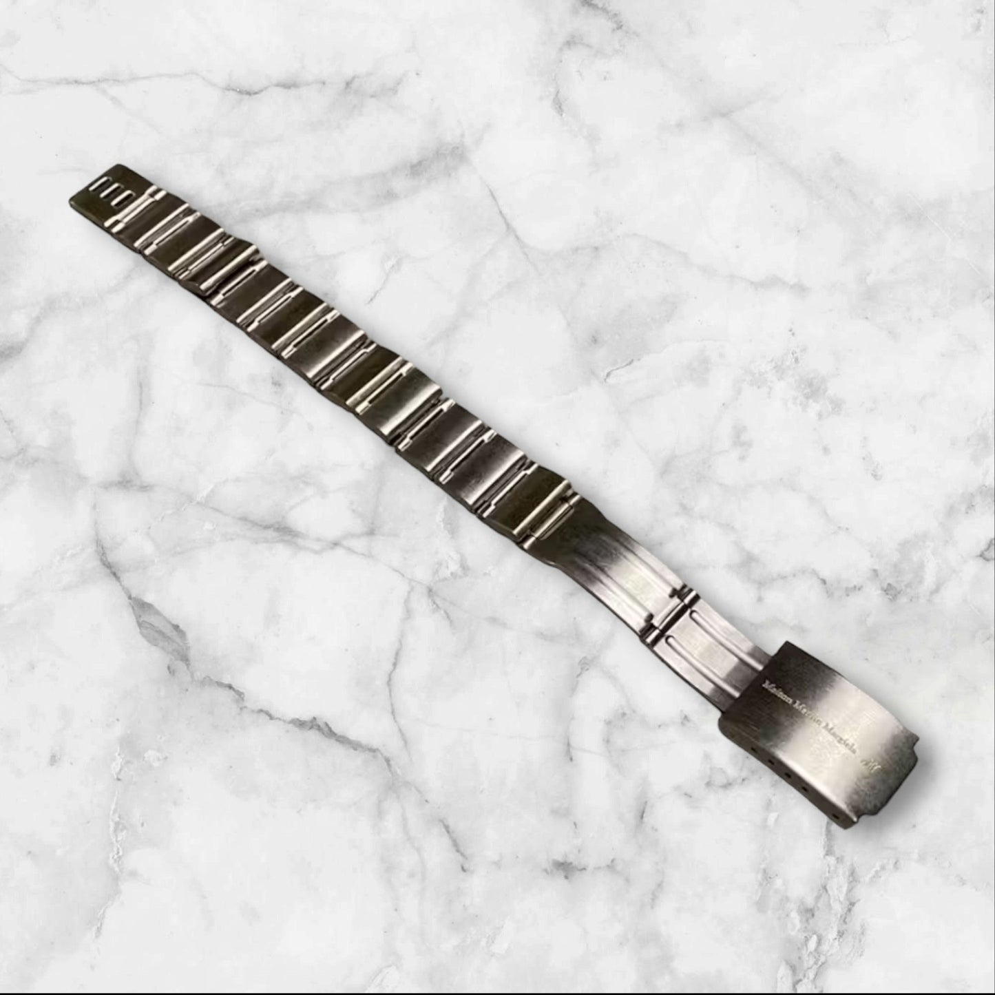Open Clasp Bracelet From the clasp of a watch