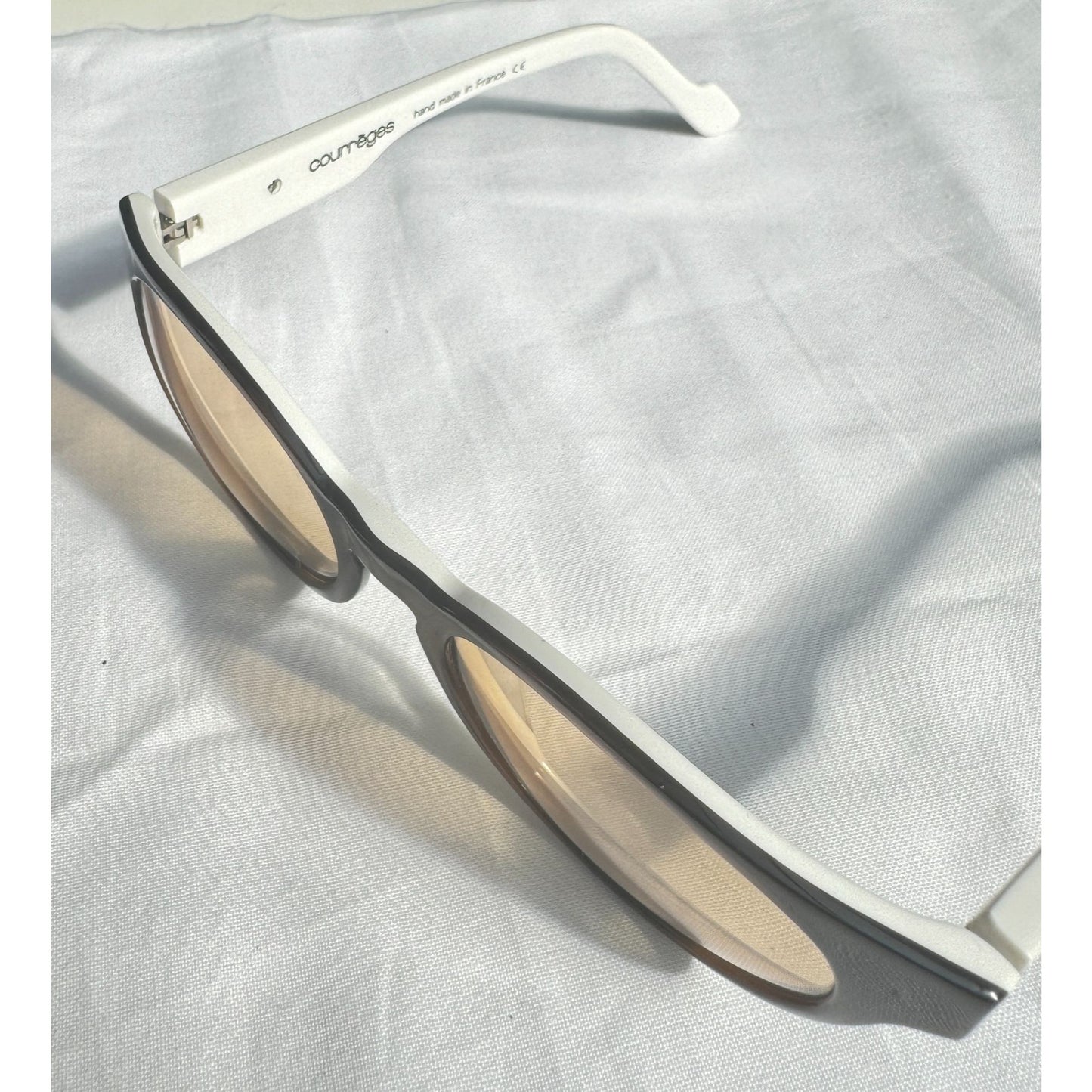 Courreges x Alain Mikli
White & Grey Photochromic Glasses