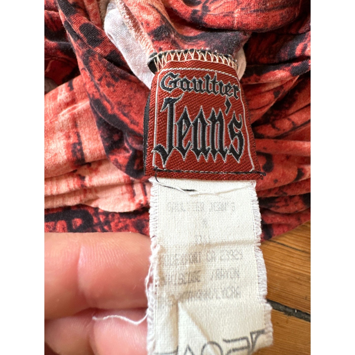 Iconic 1996 “Racism” Graffiti Print Rollneck Top