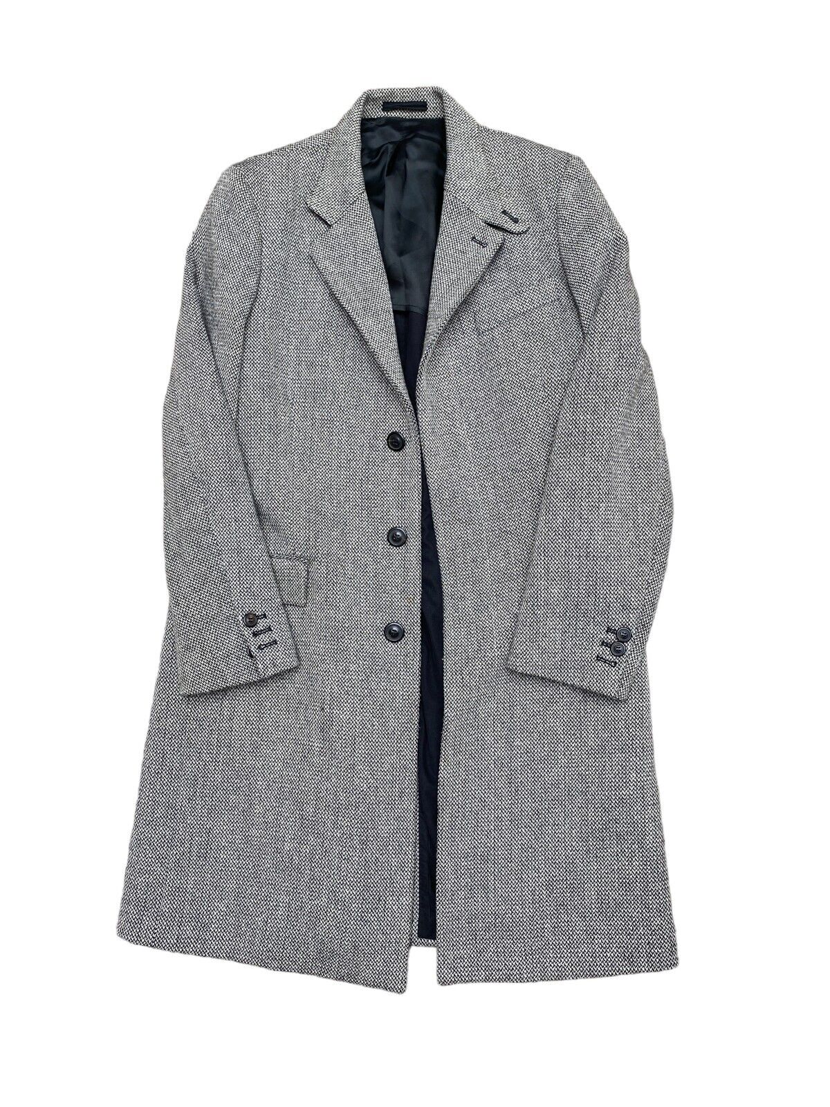 Archive
FW 2004
Grey / Black Herringbone Long Coat
Size 50