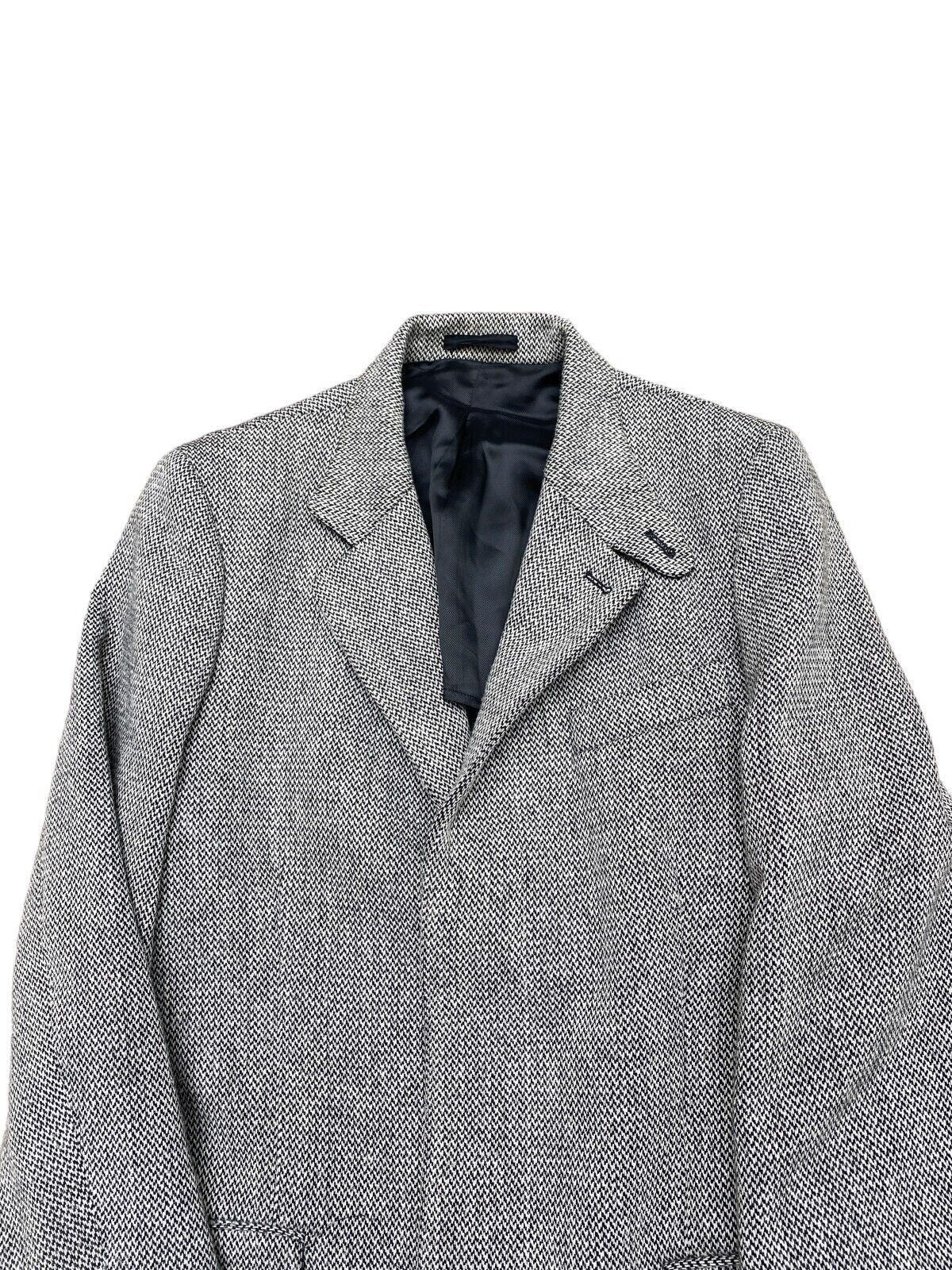 Archive
FW 2004
Grey / Black Herringbone Long Coat
Size 50